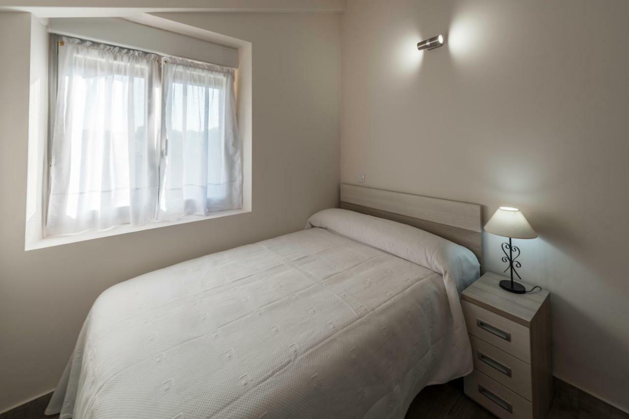 Apartamentos Turisticos El Ponton อาร์นูเอโร ภายนอก รูปภาพ
