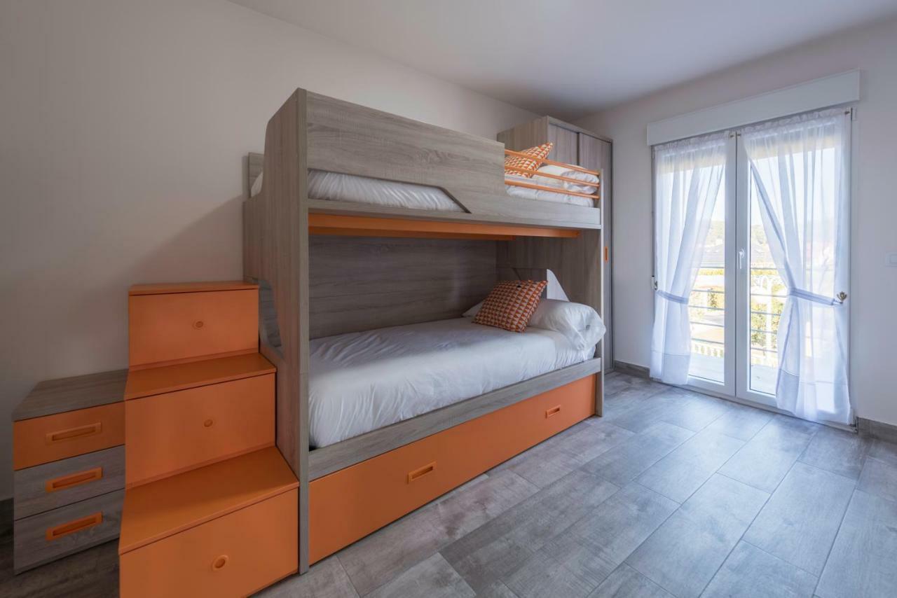 Apartamentos Turisticos El Ponton อาร์นูเอโร ภายนอก รูปภาพ